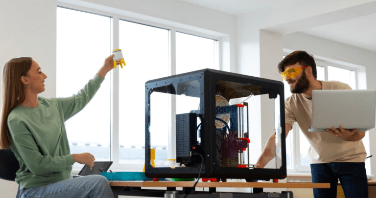 Design engineer working on a 3d printer.