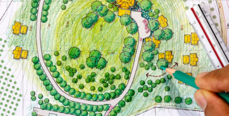 Landscape designer drawing a map