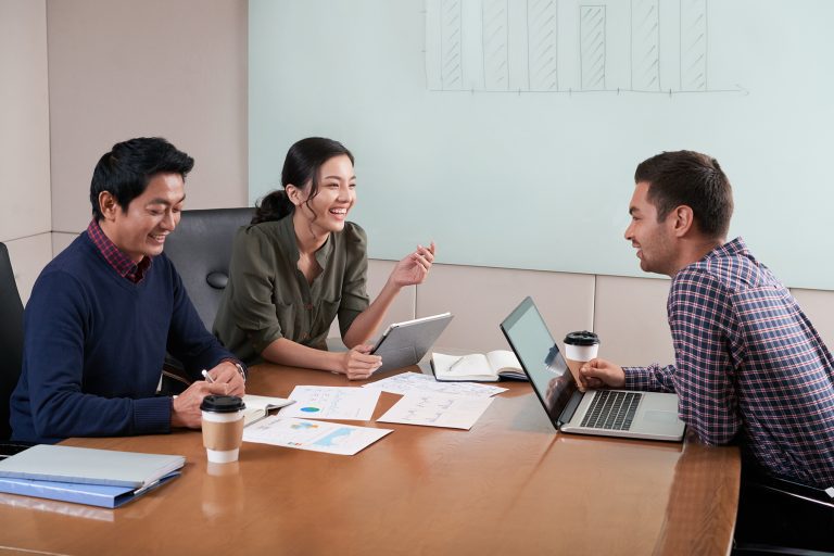 meeting of a design manager and his coworkers